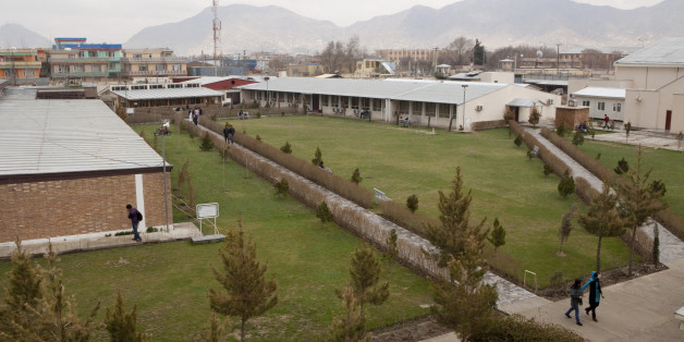 KABUL, AFGHANISTAN - MARCH 31: Students walk through campus at the American University of Kabul on March 31, 2012 in Kabul, Afghanistan. The school is a new institution based on international standards that offers bachelors degrees in business administration, computer science, public administration and political science. There are about 800 full-time students plus about 900 part-time continuing education students. (Photo by Melanie Stetson Freeman/The Christian Science Monitor via Getty Images)