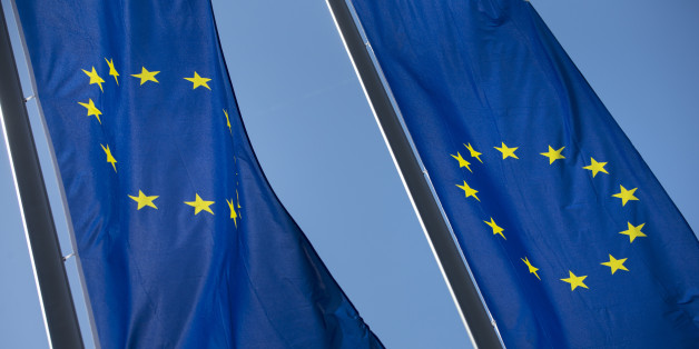 The stars of the European Union (EU) sit on banners flying outside the European Central Bank (ECB) headquarters ahead of ECB President Mario Draghi's news conference to announce the central bank's interest rate decision in Frankfurt, Germany, on Thursday, April 21, 2016. With no new measures expected at Thursdays monetary-policy meeting, the ECB president may use his press conference to point to signs that negative rates, free bank loans and a 1.7 trillion-euro ($1.9 trillion) bond-buying progra