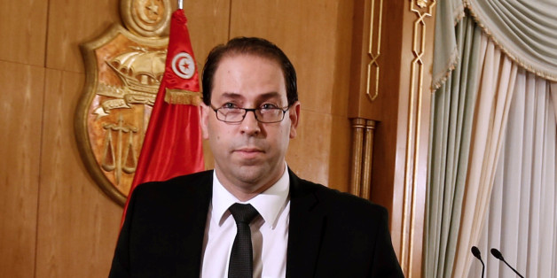 Tunisia's Prime Minister-designate Youssef Chahed leaves after a news conference in Tunis,Tunisia, August 20, 2016. Picture taken August 20, 2016. REUTERS/Zoubeir Souissi