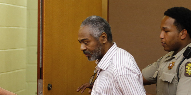 Martin Blackwell is led out of a courtroom after being found guilty during his trial in Atlanta, Wednesday, Aug. 24, 2016. Blackwell was convicted of pouring hot water on two gay men as they slept and sentenced to 40 years in prison. (AP Photo/John Bazemore)