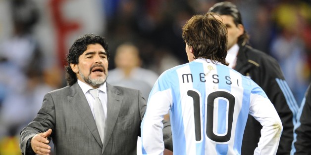 Argentina's coach Diego Maradona (L) looks dejected in front of Argentina's striker Lionel Messi after they lost the 2010 World Cup quarter-final football match Argentina vs. Germany on July 3, 2010 at Green Point stadium in Cape Town. Germany qualified for the semi-finals. NO PUSH TO MOBILE / MOBILE USE SOLELY WITHIN EDITORIAL ARTICLE - AFP PHOTO / DANIEL GARCIA (Photo credit should read DANIEL GARCIA/AFP/Getty Images)