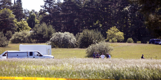OAKLAND TOWNSHIP, MI - JUNE 17: FBI agents search a field outside Detroit for the alleged remains of former Teamsters' union president Jimmy Hoffa June 17, 2013 in Oakland Township, Michigan. The agents were acting on a tip provided by Tony Zerilli, 85, a former mobster, who was released from prison in 2008. Hoffa, who had reported ties to organized crime, went missing in July of 1975. (Photo by Bill Pugliano/Getty Images)