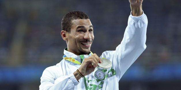 2016 Rio Olympics - Athletics - Victory Ceremony - Men's 1500m Victory Ceremony - Olympic Stadium - Rio de Janeiro, Brazil - 20/08/2016. Taoufik Makhloufi (ALG) of Algeria poses with his silver medal. REUTERS/Stoyan Nenov FOR EDITORIAL USE ONLY. NOT FOR SALE FOR MARKETING OR ADVERTISING CAMPAIGNS.
