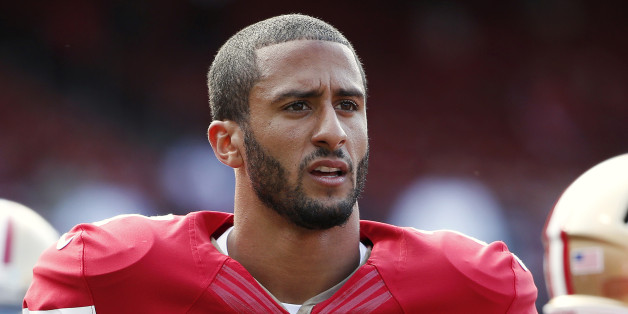 San Francisco 49ers quarterback Colin Kaepernick stands on the field before their NFL pre-season football game against the Denver Broncos in San Francisco, California, U.S. August 8, 2013. REUTERS/Stephen Lam/File Photo