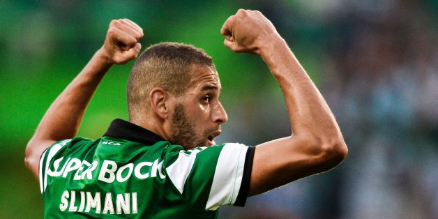 Sporting's Algerian forward Islam Slimani celebrates after scoring against VFL Wolfsburg during the Violinos Cup football match between Sporting CP and VFL Wolfsburg at Alvalade stadium in Lisbon on July 30, 2016. / AFP / PATRICIA DE MELO MOREIRA (Photo credit should read PATRICIA DE MELO MOREIRA/AFP/Getty Images)