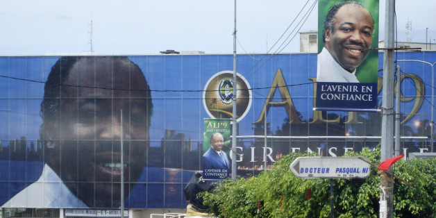 A giant poster of Ali Ben Bongo, the ruling party candidate and son of the former president, is seen in the capital Libreville, August 23, 2009. The winner of Gabon's August 30 presidential election will have to tackle a stretched budget and an oil economy in long-term decline, but international partners are unlikely to see a shift from investor-friendly policies. None of the candidates standing to succeed Omar Bongo, who towered over the central west African state for four decades until he died