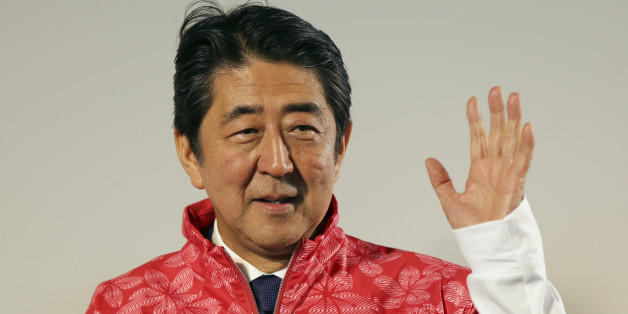 Japanese Prime Minister Shinzo Abe visits the Japan House to greet his country's Olympic athletes and delegates, in Rio de Janeiro August 21, 2016. REUTERS/Bruno Kelly