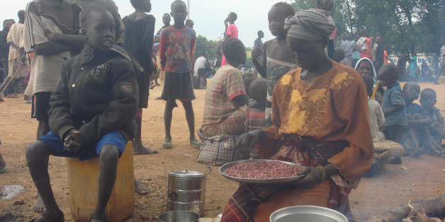 A displaced South Sudanese woman prepares a meal in a camp for internally displaced people in the UNMISS compound in Tomping, Juba, South Sudan, July 12, 2016. Beatrice Mategwa/United Nations Mission in South Sudan (UNMISS)/Handout via REUTERS ATTENTION EDITORS - THIS IMAGE WAS PROVIDED BY A THIRD PARTY. EDITORIAL USE ONLY.?