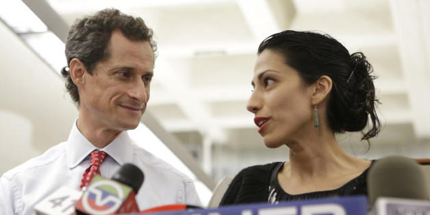 FILE - In this July 23, 2013 file photo, Huma Abedin, alongside her husband, then-New York mayoral candidate Anthony Weiner, speaks during a news conference in New York. Democratic presidential candidate Hillary Clinton aide Huma Abedin says she is separating from husband Anthony Weiner after another sexting revelation involving the former congressman from New York. (AP Photo/Kathy Willens, File)