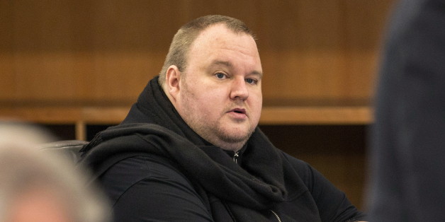German tech entrepreneur Kim Dotcom sits in a chair during a court hearing in Auckland, New Zealand, September 24, 2015. A New Zealand court hearing will determine whether Dotcom will face charges of copyright infringement, racketeering and money laundering in the United States related to the Megaupload file-sharing site he founded in 2005. REUTERS/Nigel Marple
