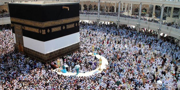 MECCA, SAUDI ARABIA - SEPTEMBER 27: Muslim pilgrims gathering for the annual Hajj pilgrimage circle counterclockwise toward the Kaaba, Islam's holiest shrine, at Masjid al-Haram in the Muslim holy city of Mecca, Saudi Arabia on September 27, 2014 ahead of the upcoming Eid Al-Adha. The week of Hajj, the fifth of the pillars of Islam, occurs during the last month of the Islamic calendar which coincides with the Eid al-Adha festival this year. (Photo by Dilek Mermer/Anadolu Agency/Getty Images)