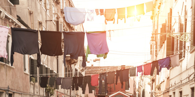 Laundry hanging from apartment buildings