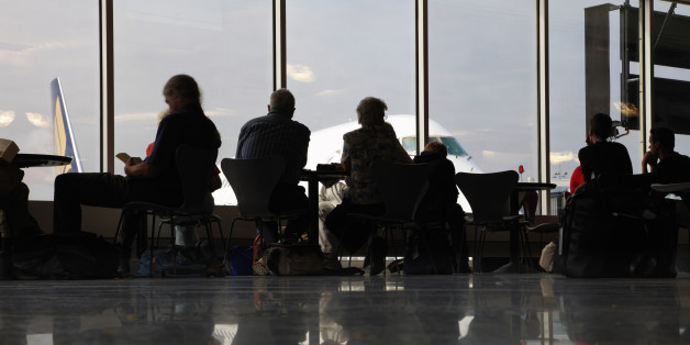 People in airport waiting area, Frankfurt, Germany