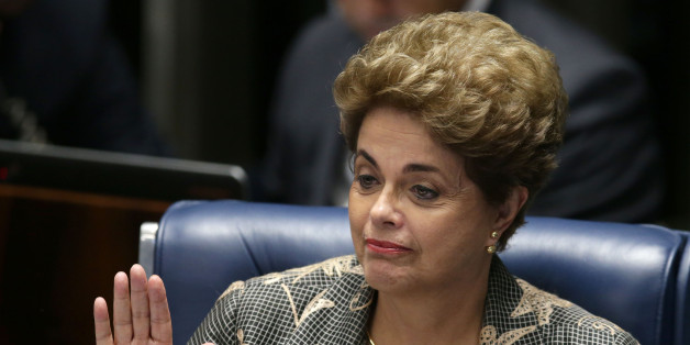 Suspended Brazilian President Dilma Rousseff waves goodbye after her impeachment trial at the Federal Senate in Brasilia, Brazil, Monday, Aug. 29, 2016. Rousseff's scheduled appearance during her impeachment trial is the culmination of a fight going back to late last year, when opponents in Congress presented a measure seeking to remove her from office. Her accusers say she hurt the economy with budget manipulations; she argues she did nothing wrong and is being targeted by corrupt lawmakers. (AP Photo/Eraldo Peres)