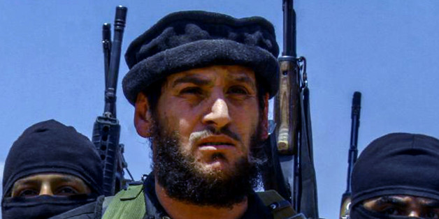 This undated image posted online Wednesday, Aug. 31, 2016, by supporters of the Islamic State group on an anonymous photo sharing website, shows Abu Mohammed al-Adnani, IS's spokesman and chief strategist, who laid out the blueprint for the extremist group's attacks against the West. The IS-run Aamaq news agency said Tuesday, Aug 30, 2016, that al-Adnani was killed while overseeing operations in northern Syria, without providing further details. (Militant Photo via AP)