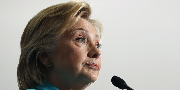 FILE - In this Aug. 25, 2016 file photo, Democratic presidential candidate Hillary Clinton pauses as she speaks at a campaign event in Reno, Nev. Hillary Clinton plans to address Americaâs leadership in the world during a speech in the battleground state of Ohio, arguing that Republican nominee Donald Trump would undermine the countryâs greatness while she would maintain it. (AP Photo/Carolyn Kaster, File)