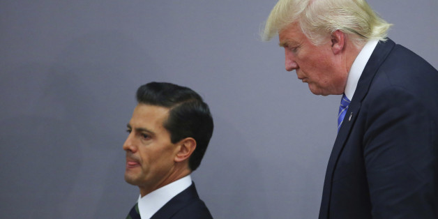 MEXICO CITY, MEXICO - AUGUST 31: President of Mexico Enrique Pena Nieto walks along US Republican presidential candidate Donald Trump after a meeting at Los Pinos on August 31, 2016 in Mexico City, Mexico. President of Mexico Enrique Pena Nieto invited both presidential candidates, Hillary Clinton and Donald Trump to talk about the bilateral relation between Mexico and the United States, being Trump the first one to accept the invitation. (Photo by Hector Vivas/LatinContent/Getty Images)
