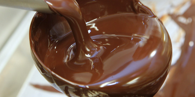 Melted chocolate is poured on October 28, 2011 in Troyes, at the workshop of Pascal Caffet, awarded 'Meilleur Ouvrier de France' (best craftsman of France) in the category pastrymaking, chocolate maker of French gourmet food company Fauchon. AFP PHOTO FRANCOIS NASCIMBENI (Photo credit should read FRANCOIS NASCIMBENI/AFP/Getty Images)