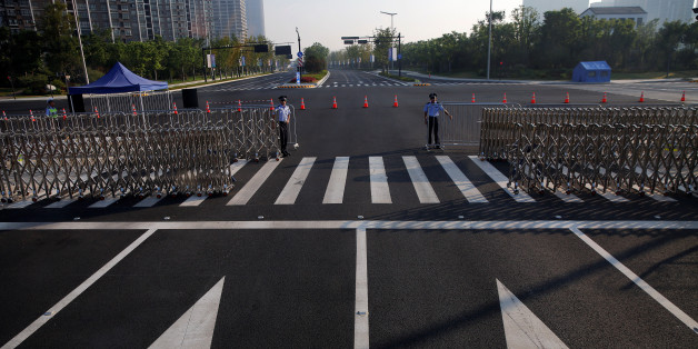 Policemen secure the road near the venue of the G20 Summit in Hangzhou, Zhejiang province, China September 3, 2016. REUTERS/Damir Sagolj