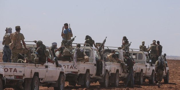 ALEPPO, SYRIA - SEPTEMBER 04 : Members of Free Syrian Army patrol at Kandura town near Jarabulus District after it freed from Daesh terrorists during the 'Operation Euphrates Shield' in Aleppo, Syria on September 04, 2016. The anti-Daesh operation called Euphrates Shield, which was launched on August 24, aims at improving security, supporting coalition forces, supporting Syrias territorial integrity and eliminating the terror threat along Turkeys border through Free Syrian Army (FSA) fighters ba