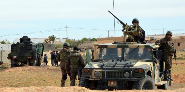 Tunisian special forces patrol in the southern town of Ben Guerdane, near the Libyan border, during clashes with jihadists on March 8, 2016 a day after the attack on the border town.
Tunisian security forces pressed a search for jihadists near the Libyan border after a deadly raid the authorities described as an unprecedented assault by the Islamic State group.
/ AFP / FATHI NASRI (Photo credit should read FATHI NASRI/AFP/Getty Images)