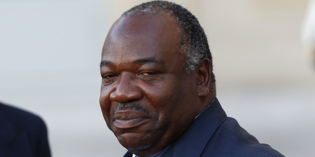 FILE-In this file photo taken on Tuesday, Nov. 10, 2015, Gabon's President Ali Bongo Ondimba, leaves the Elysee Palace after a meeting with French President Francois Hollande as part of preparation of the upcoming COP21 Climate Conference in Paris, France. Voting has started in Gabon, where the president is trying to overcome a coalition of high-profile opponents to win re-election and maintain a family dynasty that stretches back to the 1960s. (AP Photo/Francois Mori, File)