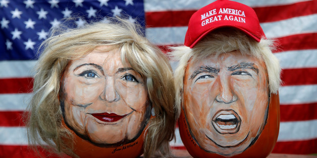 The images of U.S. Democratic presidential candidate Hillary Clinton (L) and Republican Presidential candidate Donald Trump are seen painted on decorative pumpkins created by artist John Kettman in LaSalle, Illinois, U.S., June 8, 2016. REUTERS/Jim Young TPX IMAGES OF THE DAY