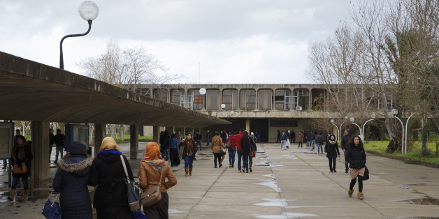 ALGIERS, ALGERIA - JANUARY 25: Students walk across campus of University of Sciences and Technology Houari Boumediene in January 25, 2015 in Algiers, Algeria. The university buildings were designed by architect Oscar Niemeyer (Photo by Thomas Trutschel/Photothek via Getty Images)