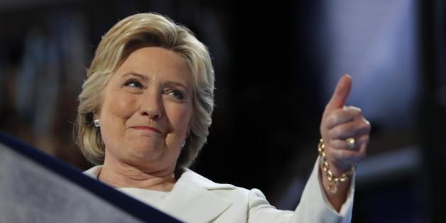 Democratic U.S. presidential nominee Hillary Clinton gives a thumbs up as she arrives to accept the nomination on the fourth and final night at the Democratic National Convention in Philadelphia, Pennsylvania, U.S. July 28, 2016. REUTERS/Jim Young