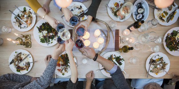View from above friends toasting wine glasses