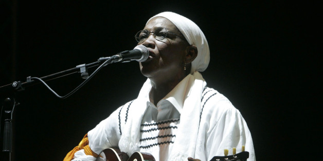 Algerian singer Hasna el Becharia performs during the second Pan African Cultural Festival (Panaf) of Algiers at Riad el Feth in Algiers July 12, 2009. Algeria hosted the first edition of the Panaf in 1969, and plans to revive its artistic influence over Africa with its second edition. REUTERS/Louafi Larbi (ALGERIA SOCIETY ENTERTAINMENT)