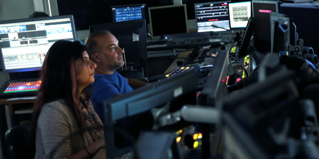 Employees are seen at the control room of Greek private channel SKAI in Athens, Greece, August 30, 2016. REUTERS/Alkis Konstantinidis