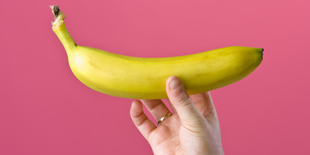 Person holding banana