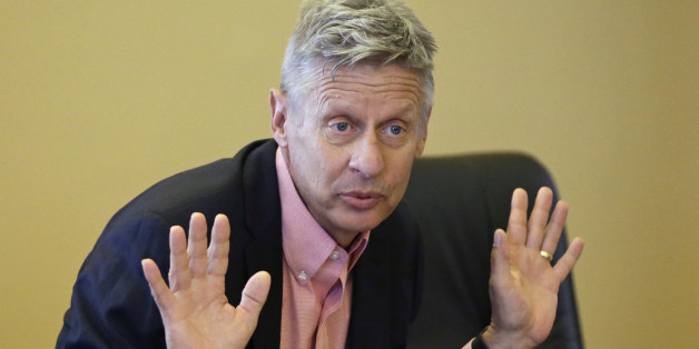FILE - In this May 18, 2016 file photo, Libertarian presidential candidate, former New Mexico Gov. Gary Johnson speaks with legislators at the Utah State Capitol in Salt Lake City. The day after political heavyweight Mitt Romney name-dropped him on Twitter, the former New Mexico governor seemed to reveal a hole in his foreign-affairs knowledge when he was befuddled by an otherwise routine question about the Syrian city of Aleppo. (AP Photo/Rick Bowmer, File)