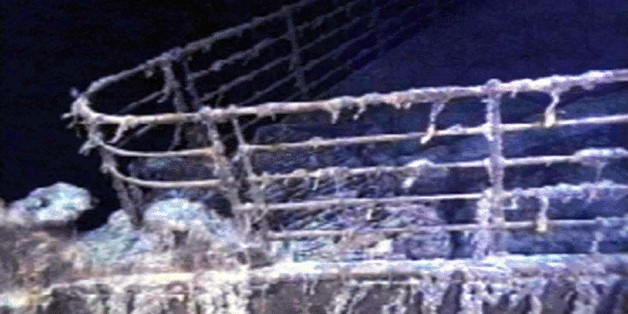 The port bow railing of the RMS Titanic lies in 12,600 feet of water about 400 miles east of Nova Scotia as photographed August 10, 1996, as part of a joint scientific and recovery expedition sponsored by the Discovery Channel and RMS Titantic. Scientists plan to illuminate and then raise the hull section of this legendary ocean liner later this month. ? QUALITY DOCUMENT