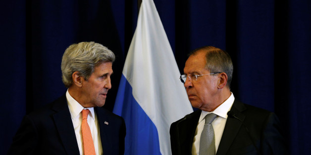 U.S. Secretary of State John Kerry and Russian Foreign Minister Sergei Lavrov (R) look toward one another during a news conference following their meeting in Geneva, Switzerland where they discussed the crisis in Syria September 9, 2016. REUTERS/Kevin Lamarque