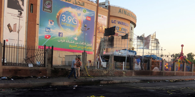 A member of Iraqi security forces walks past at the site of a suicide bomb attack at Nakheel Mall across from the oil ministry, in Baghdad, in Iraq September 10, 2016. REUTERS/Ahmed Saad