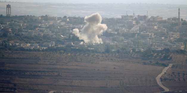 Smoke from explosions rises during fighting in the village of Jubata Al Khashab in Syria, as seen from the Israeli side of the border fence between Syria and the Israeli-occupied Golan Heights September 11, 2016. REUTERS/Baz Ratner