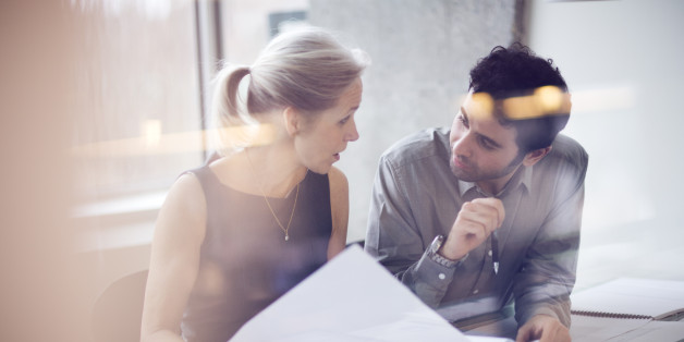 Man and woman in office having a meeting