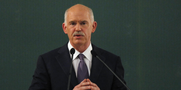 Former Greek Prime Minister George Papandreou speaks during a conference of the PASOK socialist party at Faliro, near Athens, Saturday, March 10 2012. Greece's private creditors agreed Friday to take cents on the euro in the biggest debt writedown in history, paving the way for an enormous second bailout for the country to keep Europe's economy from being dragged further into chaos. (AP Photo/Kostas Tsironis)
