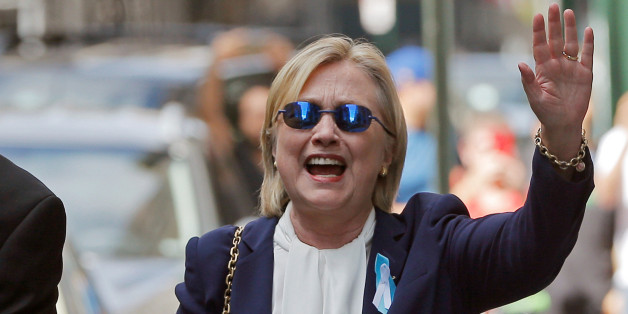 U.S. Democratic presidential candidate Hillary Clinton leaves her daughter Chelsea's home in New York, New York, United States September 11, 2016, after Clinton left ceremonies commemorating the 15th anniversary of the September 11 attacks feeling "overheated." REUTERS/Brian Snyder/File Photo
