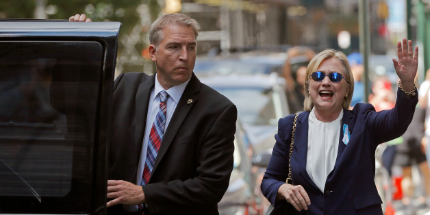 U.S. Democratic presidential candidate Hillary Clinton leaves her daughter Chelsea's home in New York, New York, United States September 11, 2016, after Clinton left ceremonies commemorating the 15th anniversary of the September 11 attacks feeling "overheated." REUTERS/Brian Snyder/File Photo