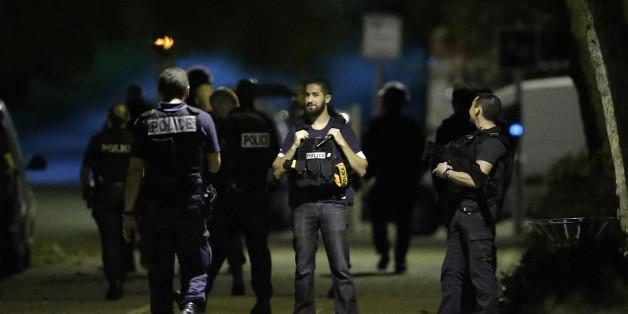 French policemen take part in a police raid in Boussy-Saint-Antoine near Paris, France, September 8, 2016. French police investigating the abandonment of a car packed with gas cylinders near Paris's Notre Dame cathedral last Saturday, arrested three women on Thursday evening, in Boussy-Saint-Antoine, some 30 km south-east of Paris. REUTERS/Christian Hartmann