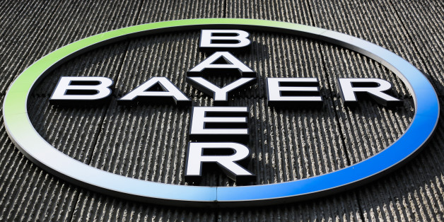 FILE - This Monday, May 23, 2016, file photo, shows the Bayer AG corporate logo displayed on a building of the German drug and chemicals company in Berlin. Monsanto is rejecting Bayer's $62 billion takeover bid, calling it "incomplete and financially inadequate. However, the seed company suggested Tuesday, May 24, 2016, that a higher bid might be accepted, saying that it remains open to talks. (AP Photo/Markus Schreiber, File)