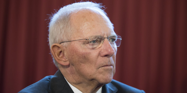 Wolfgang Schaeuble, Germany's finance minister, center, pauses whilst speaking to journalists as he arrives for a meeting of European finance ministers in Bratislava, Slovakia, on Friday, Sept. 9, 2016. German Chancellor Angela Merkel said that European leaders meeting in Bratislava this month need to be ambitious in seeking to map out a future for the European Union after the departure of the U.K. Photographer: Jasper Juinen/Bloomberg via Getty Images