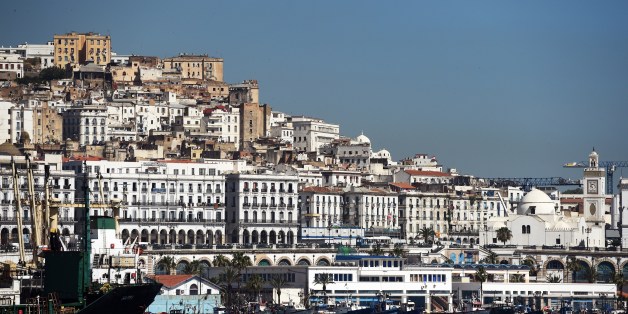 A general view taken on June 5, 2014 shows the Grand Mosque (R) situated on the promenade along the Bay of Algiers with the old town of the Algerian capital known as the 'Kasbah' in the background. Algerian authorities plan to redevelop the Bay of Algiers by 2030 with numerous renovation and expansion projects. AFP PHOTO/ FAROUK BATICHE (Photo credit should read FAROUK BATICHE/AFP/Getty Images)
