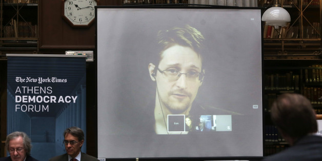 National Security Agency leaker Edward Snowden speaks via video link during the Athens Democracy Forum, organised by the New York Times, at the National Library in Athens, on Friday, Sept. 16, 2016. Snowden, in exile in Moscow after leaking U.S. National Security Agency documents, said Friday he intends to vote in the U.S. presidential election, but did not say which candidate he favors. (Kostas Baltas, InTime Sports via AP)