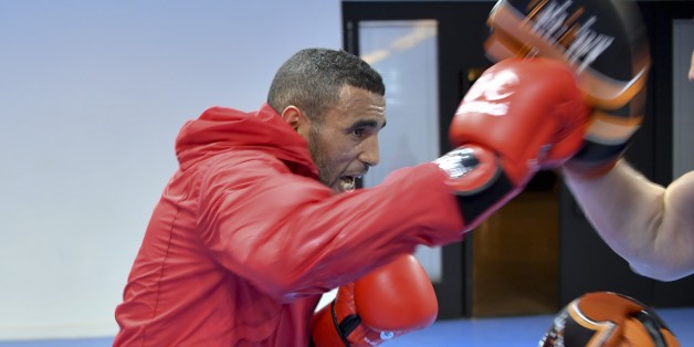 Moroccos's boxer Saada Hassan, 81 kg category, practices with his coach during a training session at the Riocentro complex in Rio de Janeiro, Brasil on August 1, 2016. / AFP / YURI CORTEZ (Photo credit should read YURI CORTEZ/AFP/Getty Images)