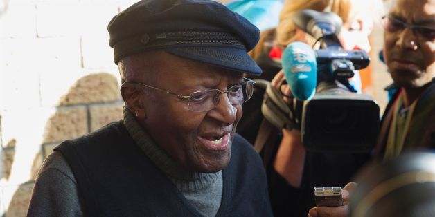 South African anti-apartheid activist and Nobel Peace Laureate Archbishop Desmond Tutu speak to journalists after casting his vote in the South African local government elections at Milnerton High School in Cape Town on August 3, 2016.
South Africans vote in closely contested municipal elections that could deal a heavy blow to the African National Congress (ANC) that has ruled since leading the struggle to end apartheid. Nelson Mandela's former party risks losing control of key cities including the capital Pretoria, the economic hub Johannesburg and coastal Port Elizabeth, according to some polls. / AFP / RODGER BOSCH (Photo credit should read RODGER BOSCH/AFP/Getty Images)