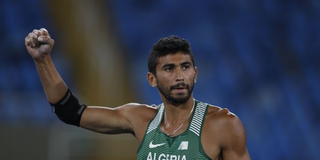Algeria's Larbi Bourrada reacts in the Men's Decathlon Javelin Throw during the athletics event at the Rio 2016 Olympic Games at the Olympic Stadium in Rio de Janeiro on August 18, 2016. / AFP / Adrian DENNIS (Photo credit should read ADRIAN DENNIS/AFP/Getty Images)